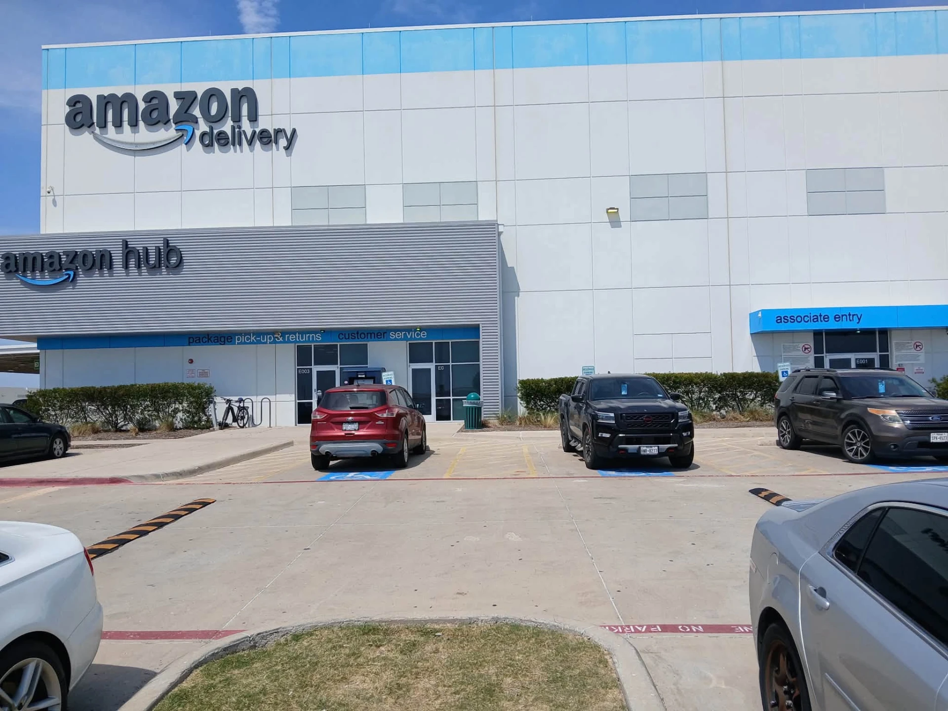 Commercial warehouse and customer entrance with clean panel exterior